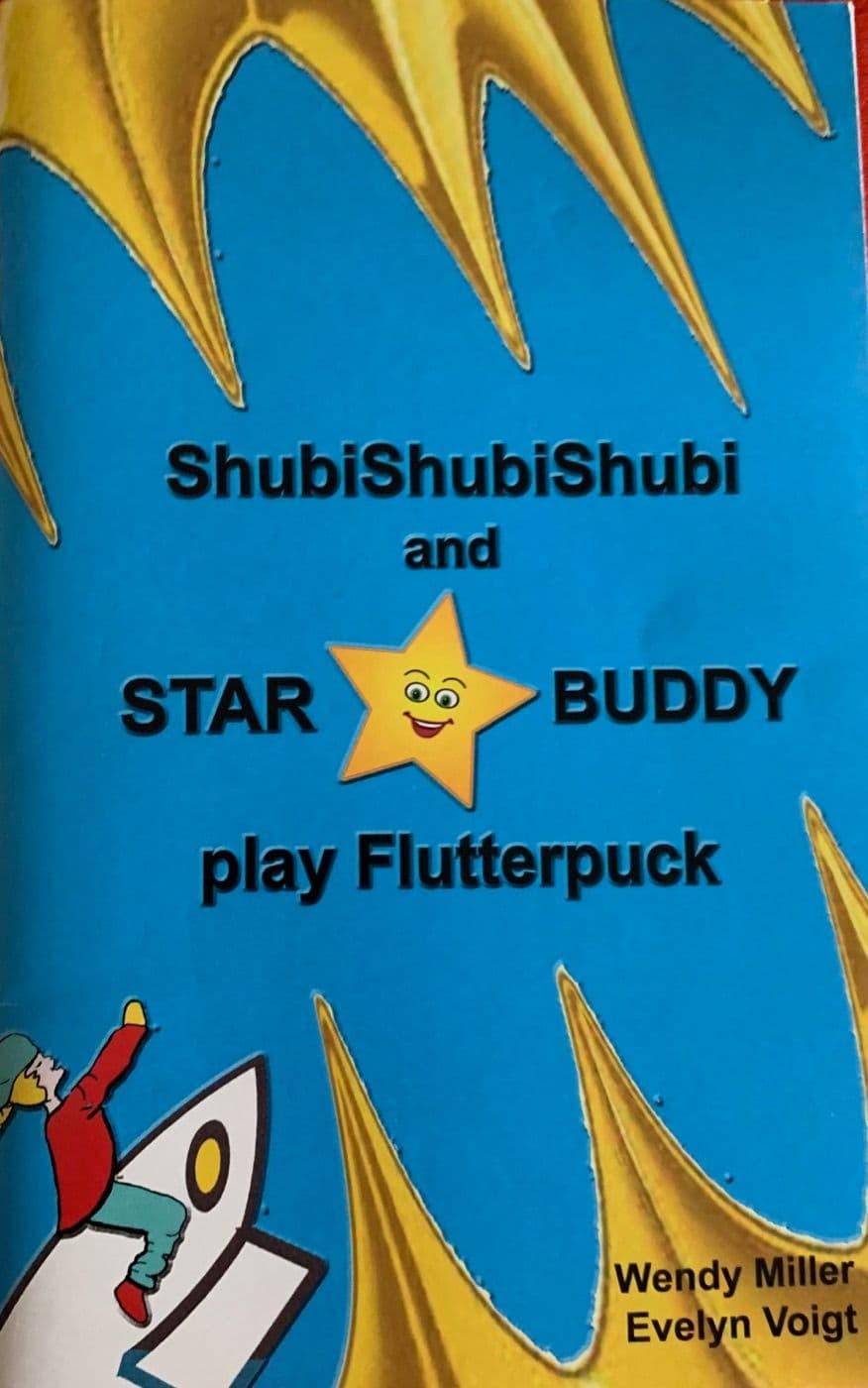 Cover of ShubiShubiShubi and Starbuddy Play Flutterpuck by Wendy Miller